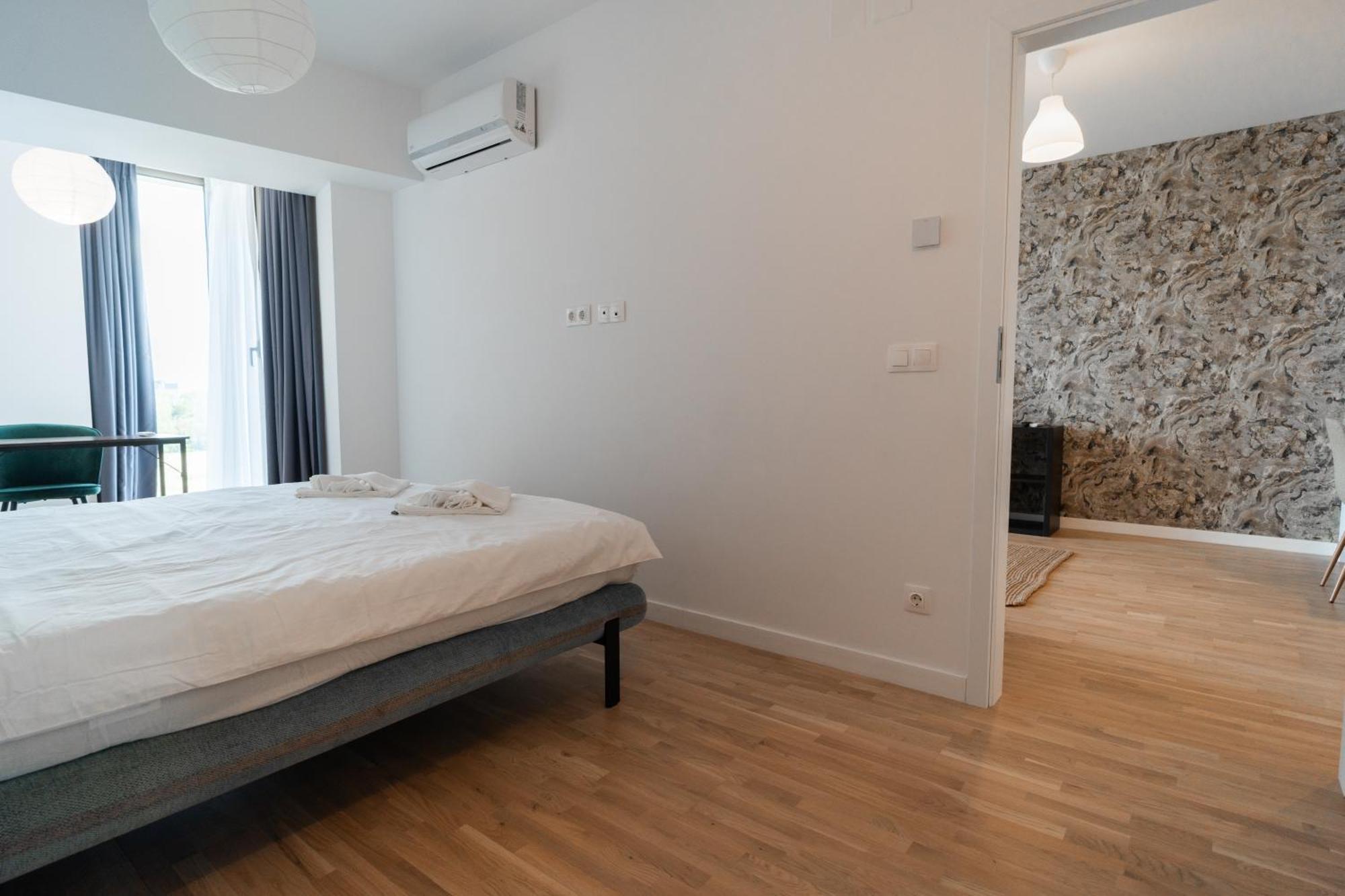 Lagoon Park Apartments With Beach View Bukares Bagian luar foto