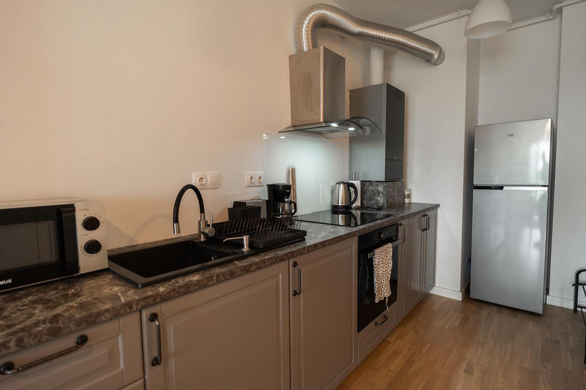 Lagoon Park Apartments With Beach View Bukares Bagian luar foto
